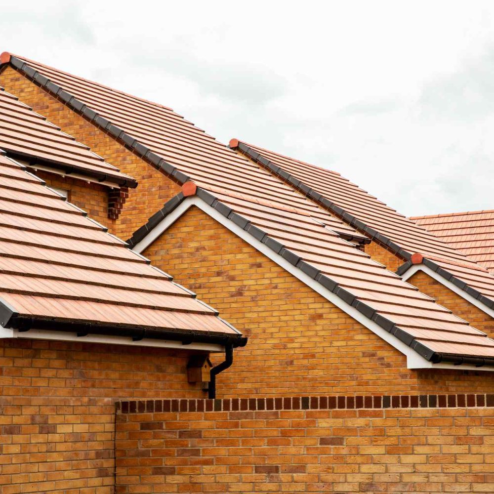exterior-view-of-yellow-brick-row-house-with-yello-2025-04-03-08-03-20-utc (1)